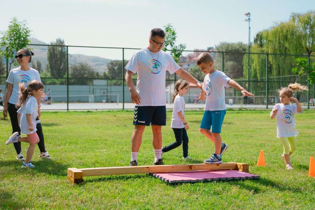 Photo by Aleksandar Andreev on Pexels Kids guided by instructors at a park balance on a beam for fun and exercise. - Photo by Aleksandar Andreev on Pexels